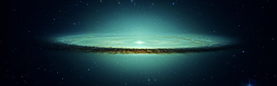 Edge-on spiral galaxy with glowing teal core and dark dust lane set against a star-filled deep space background HD wallpaper
