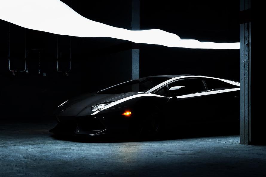 Lamborghini Aventador LP700-4 Silhouette in Dramatic Low-Key Garage Lighting HD wallpaper