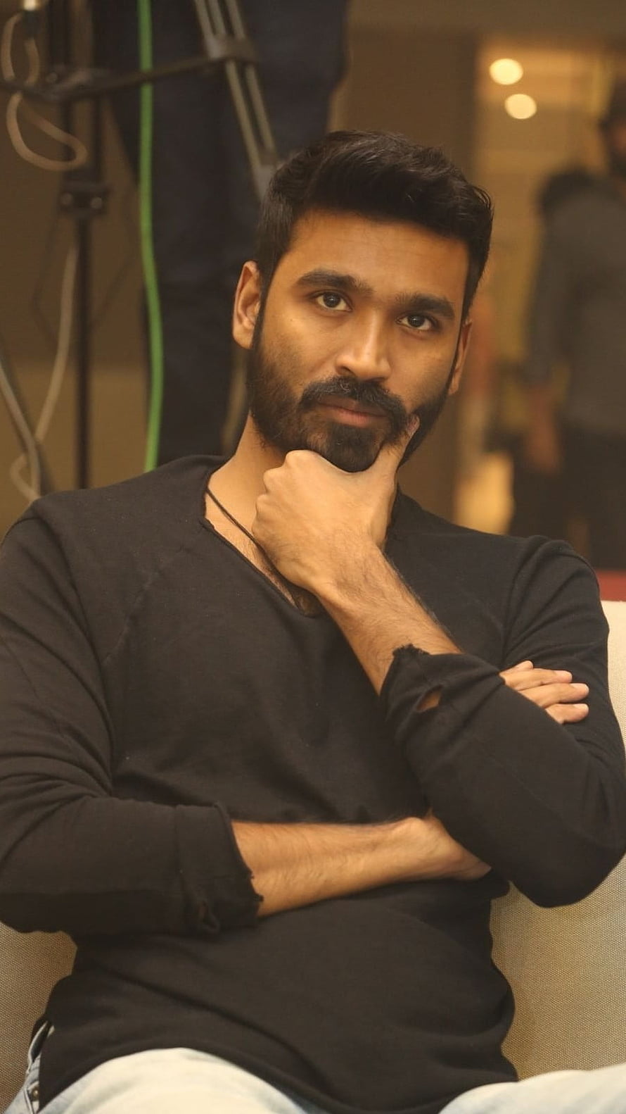 Dhanush Portrait in Black Shirt with Beard and Thoughtful Pose HD phone wallpaper