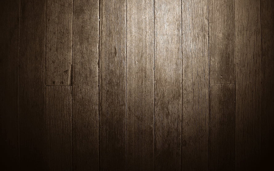 Dark Rustic Wooden Plank Texture with Dramatic Spotlight and Deep Vignette HD wallpaper