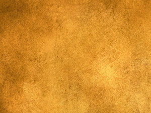 Antique Gold Textured Background with Warm Amber Tones and Subtle Surface Grain HD wallpaper