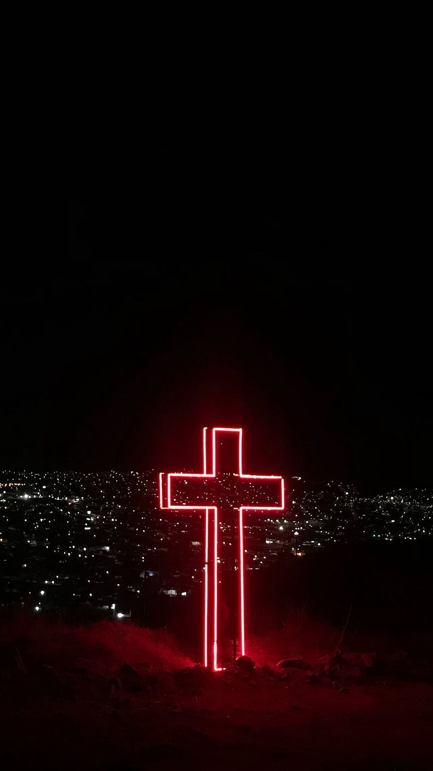 Glowing Red Neon Cross Overlooking a City at Night HD phone wallpaper