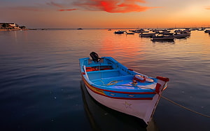 Colorful Fishing Boat Moored in Calm Harbor at Golden Sunset HD wallpaper