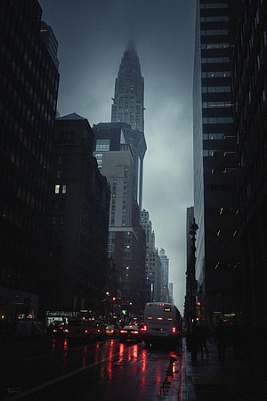 Moody Manhattan Street View with Chrysler Tower Rising Through Overcast Rain HD phone wallpaper