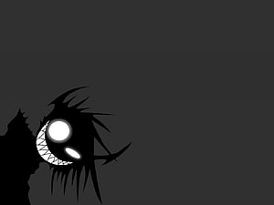 Menacing Black Creature with Glowing Eyes and Sharp Teeth on Dark Background HD wallpaper