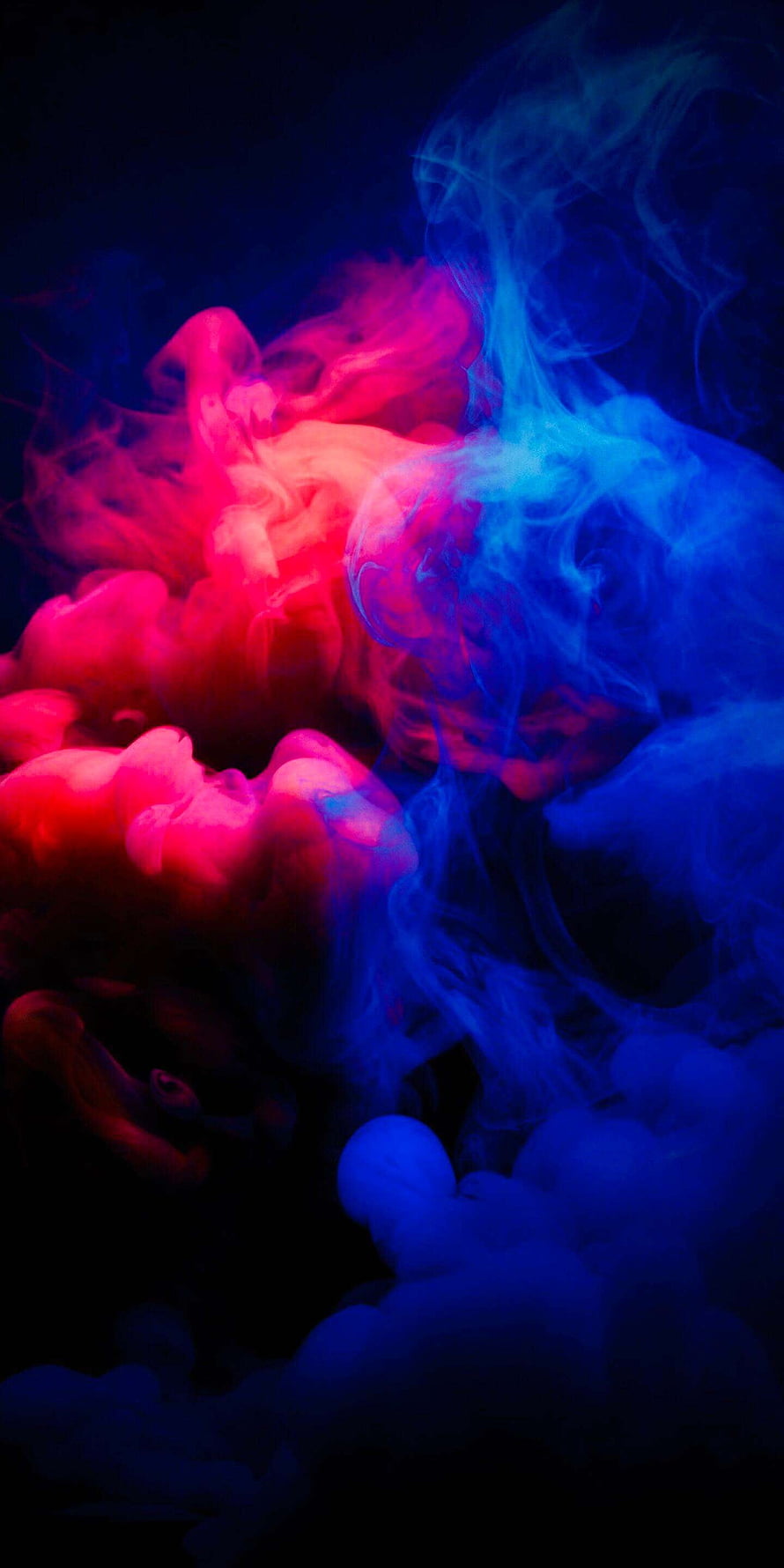 Vibrant red and blue ink clouds swirling in dark water, abstract neon smoke photography HD phone wallpaper