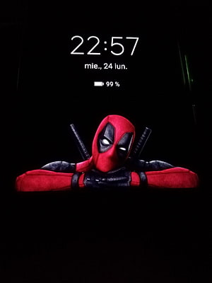 Deadpool Peeking Over Edge in Dark Cinematic Style HD phone wallpaper