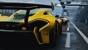 McLaren P1 GTR Rear View on Wet Race Track with Large Rear Wing and Mobil 1 Livery HD wallpaper