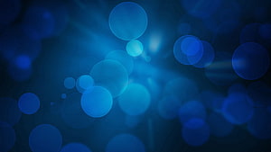 Deep Blue Abstract Bokeh Light Circles and Soft Glow Background HD wallpaper
