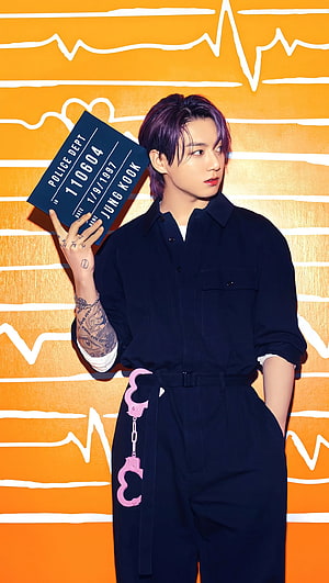 Jungkook from BTS in Black Jumpsuit with Pink Handcuffs and Police Card HD phone wallpaper