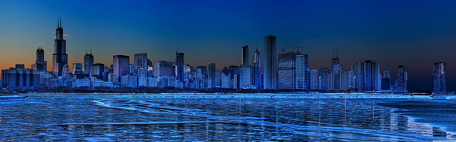 Chicago Skyline at Dusk with Lake Michigan Reflections in Cool Blue Tones HD wallpaper