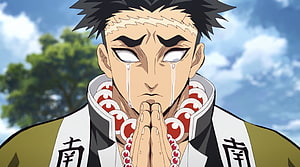 Gyomei Himejima from Demon Slayer in a Moment of Sorrowful Prayer HD wallpaper