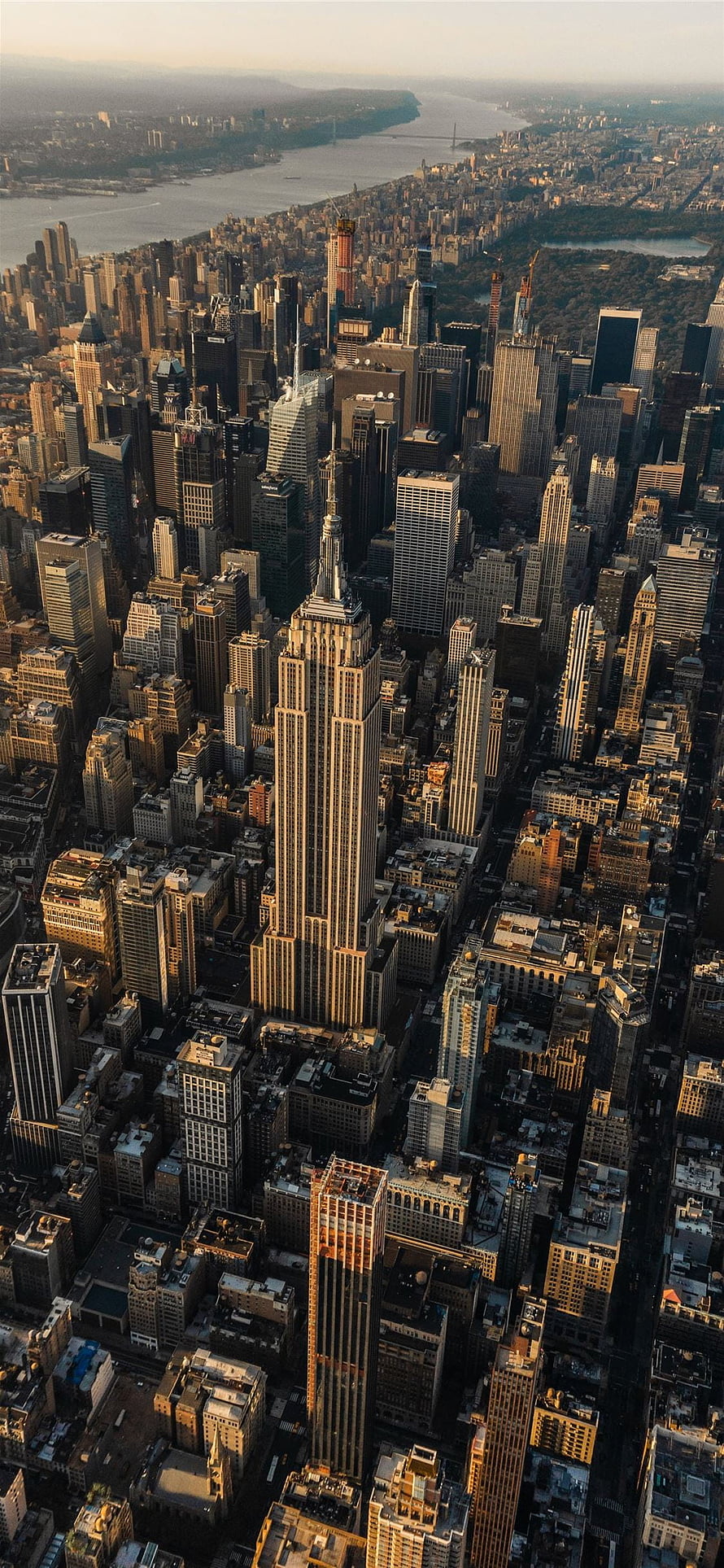 Aerial View of the Empire State Building and Manhattan Skyline at Golden Hour HD phone wallpaper