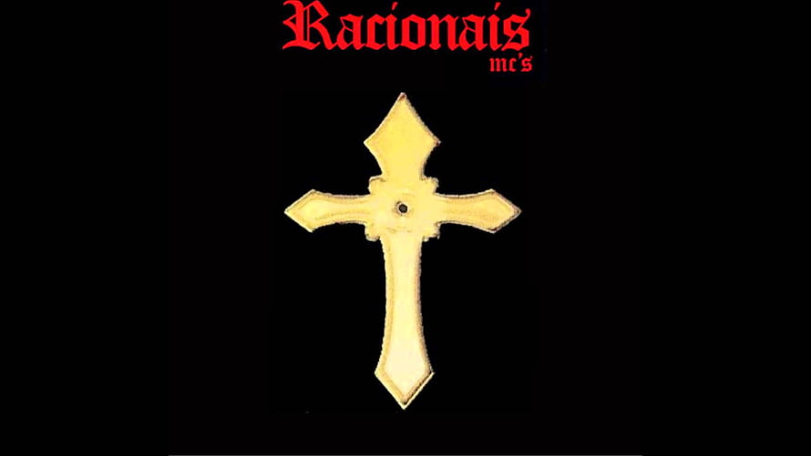 Racionais MC's Gold Cross Emblem on Black Background HD wallpaper