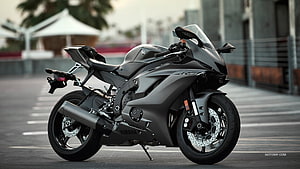 Matte Black Yamaha YZF-R6 Sportbike Parked on Urban Street HD wallpaper