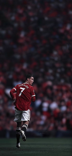 Cristiano Ronaldo in Manchester United Red Kit Running on the Pitch HD phone wallpaper