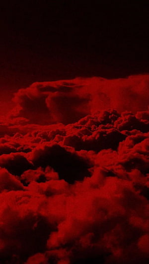 Dark red storm clouds with deep black shadows and moody atmospheric aesthetic HD phone wallpaper