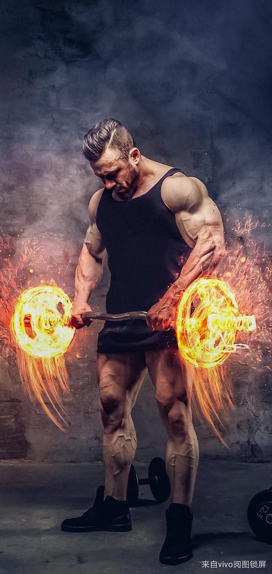 Muscular Bodybuilder Lifting a Burning Barbell in a Dark Gym Setting HD phone wallpaper