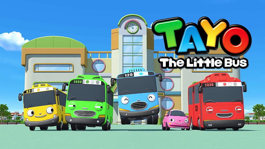 Tayo The Little Bus Animated Characters and Colorful Vehicles in Front of a Bright Building HD wallpaper
