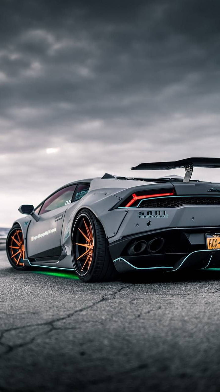 Modified Lamborghini Huracan Widebody with Orange Wheels and Underglow HD phone wallpaper