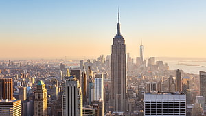 Empire State Building and Manhattan Skyline at Golden Hour in New York City HD wallpaper