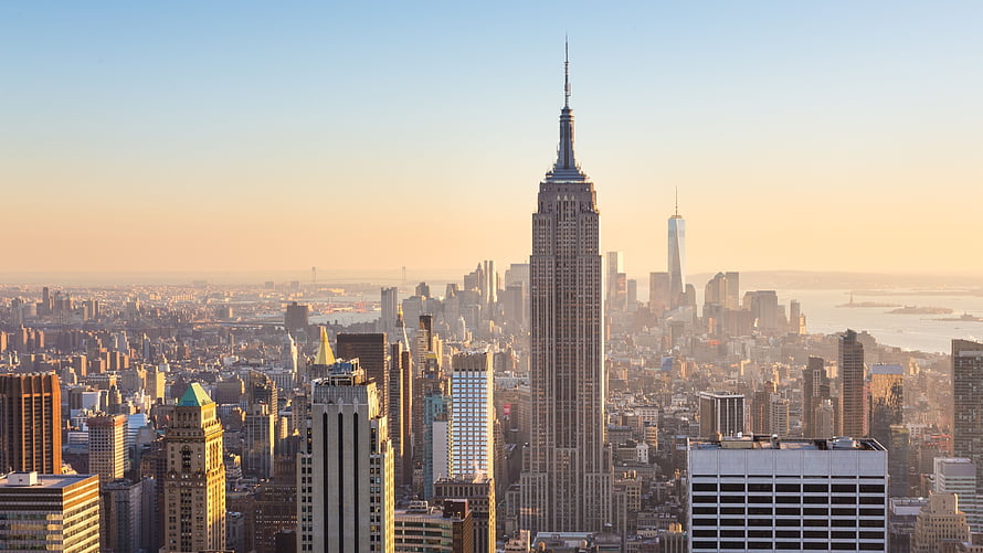 Empire State Building and Manhattan Skyline at Golden Hour in New York City HD wallpaper