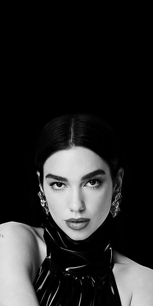 Dua Lipa Black and White Portrait in Glossy Halter Top with Statement Earrings HD phone wallpaper