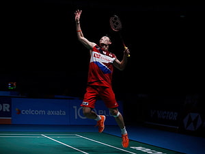 Kento Momota Badminton Player Jumping Smash Action on Court HD wallpaper