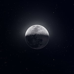 Gibbous Moon with Cratered Surface and Starry Deep Space Background HD phone wallpaper