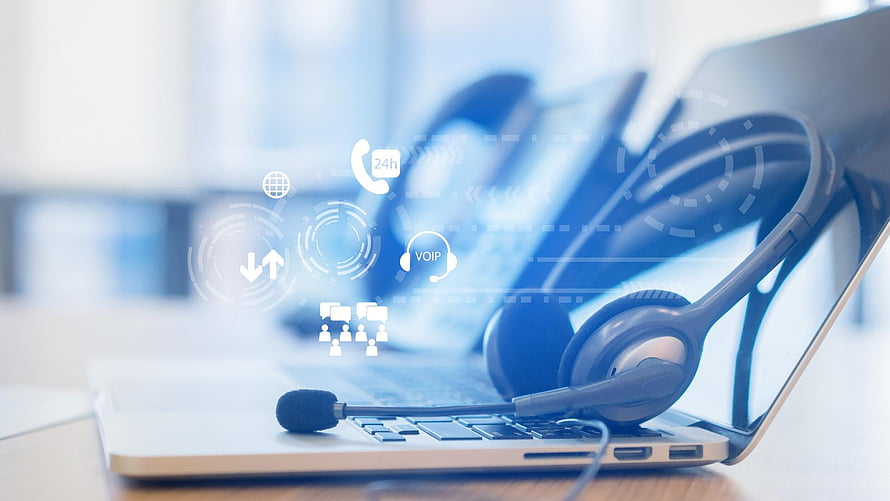 Modern Call Center Headset on Laptop with Digital Communication Icons and Voip Interface HD wallpaper