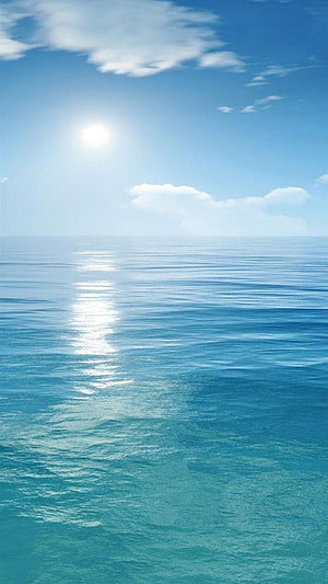Serene Ocean Horizon With Sunlight Reflection On Calm Blue Water HD phone wallpaper
