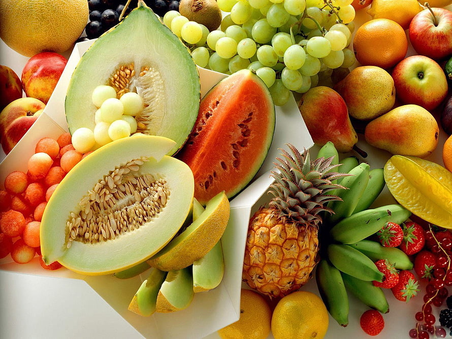 Vibrant Fresh Fruit Arrangement with Melon, Pineapple, and Berries HD wallpaper