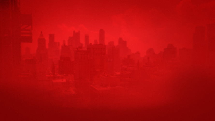 Spider-Man Red: Eerie Crimson Cityscape with Hazy Skyscrapers and Dark Atmosphere HD wallpaper