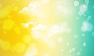 Vibrant Yellow and Teal Sky with Soft Bokeh Circles and Fluffy Clouds HD wallpaper