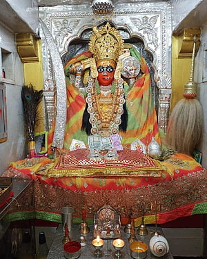 Ashapura Maa Temple Deity with Gold Crown and Ornate Silver Backdrop HD phone wallpaper
