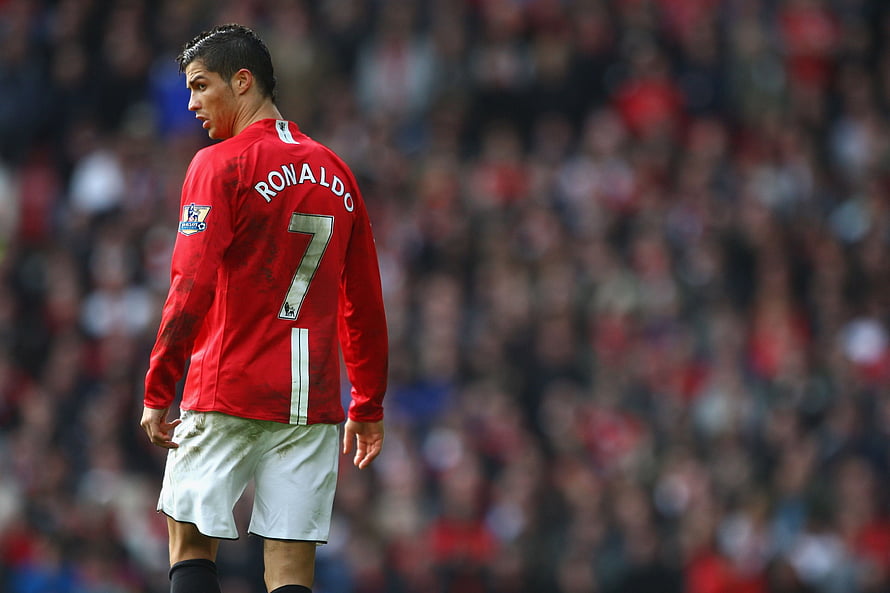 Cristiano Ronaldo in Manchester United Red Kit Number 7 on the Pitch HD wallpaper