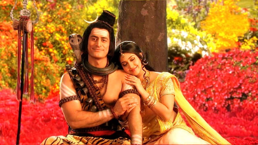 Shiva and Parvati in a Vibrant Garden Setting from Devon Ke Dev Mahadev HD wallpaper
