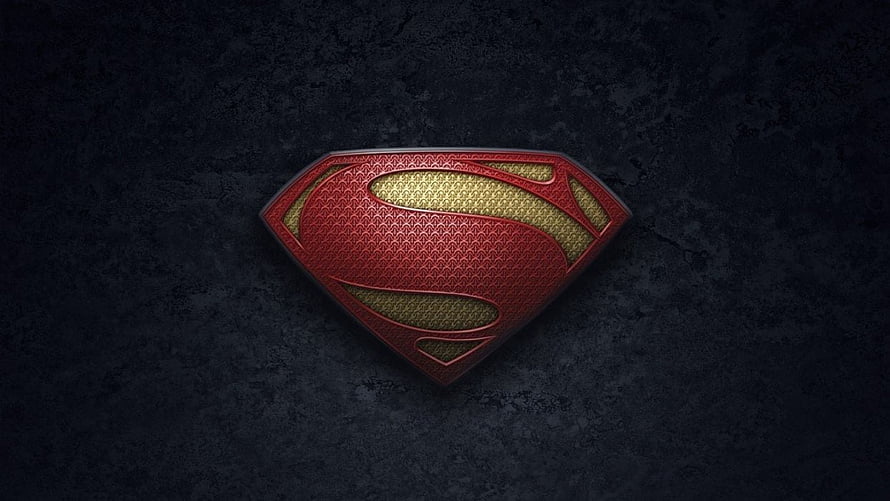 Superman S-Shield Emblem from Man of Steel on Dark Textured Background HD wallpaper