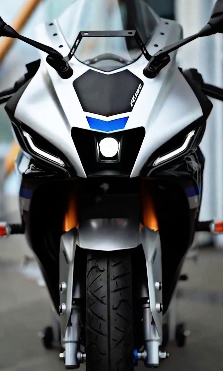 Yamaha R15M V4 Sportbike Front View with Aggressive LED Headlights and Blue Accents HD phone wallpaper