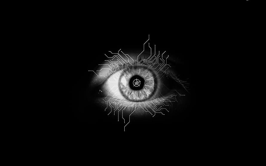 Cybernetic Human Eye with Circuit Board Overlay on Black Background HD wallpaper