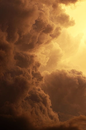 Dramatic Golden Storm Clouds Filling the Sky at Sunset HD phone wallpaper