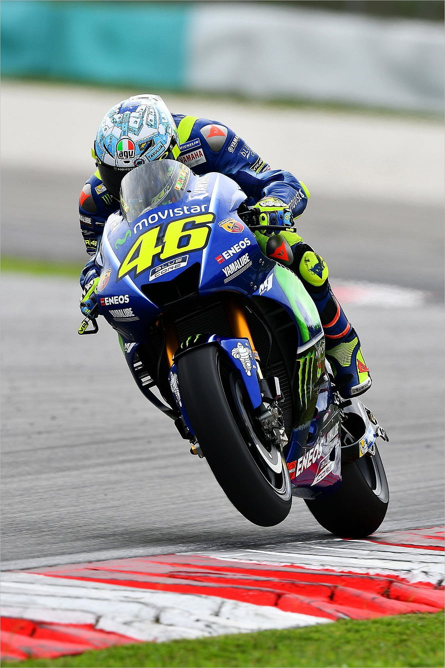 Valentino Rossi Riding Yamaha Movistar MotoGP Bike on Circuit HD phone wallpaper