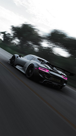 Porsche 918 Spyder in Motion on a Forest Road with Pink Taillights HD phone wallpaper