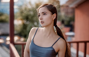 Young woman with ponytail in grey tank top on outdoor balcony, Gorgeous, brunette, teen model HD wallpaper