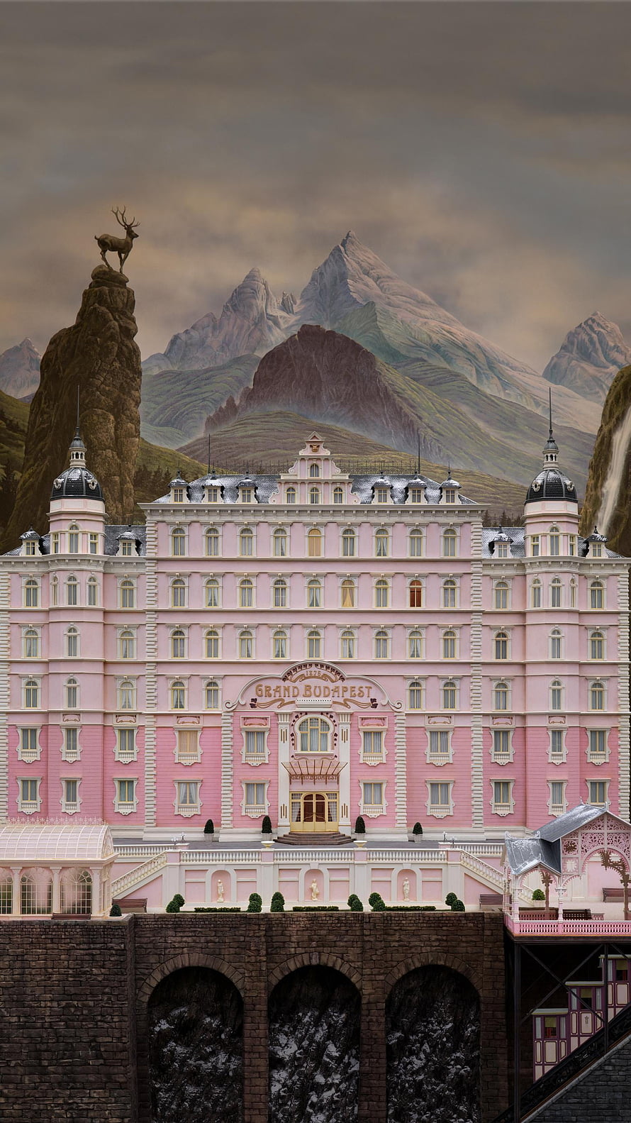 Grand Budapest Hotel Pink Facade Set Piece with Alpine Mountain Backdrop HD phone wallpaper