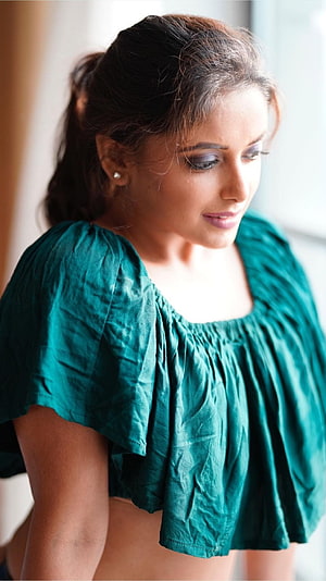 Sneha Paul in a Teal Ruffled Blouse with Soft Natural Lighting HD phone wallpaper