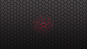 Dark Hexagonal Grid Pattern with Glowing Red Center Accent HD wallpaper