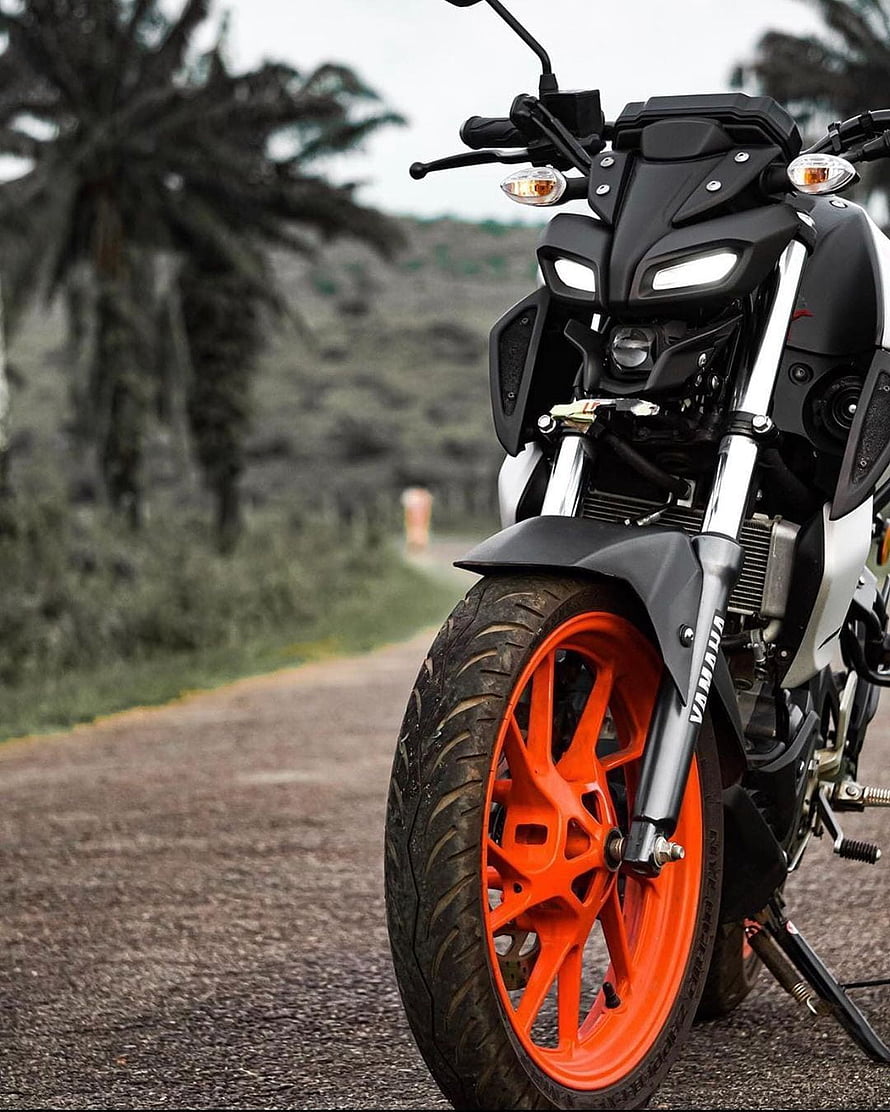 Yamaha MT15 V2 Streetfighter Motorcycle with Orange Wheels on a Gravel Road HD phone wallpaper