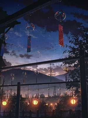 Japanese wind chimes and glowing lanterns under a starry twilight sky with distant mountains HD phone wallpaper