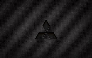 Mitsubishi Three-Diamond Emblem on Dark Carbon Fiber Texture HD wallpaper